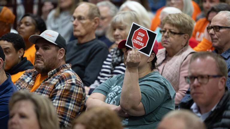 Illinois residents gathered in opposition to a proposed data center.