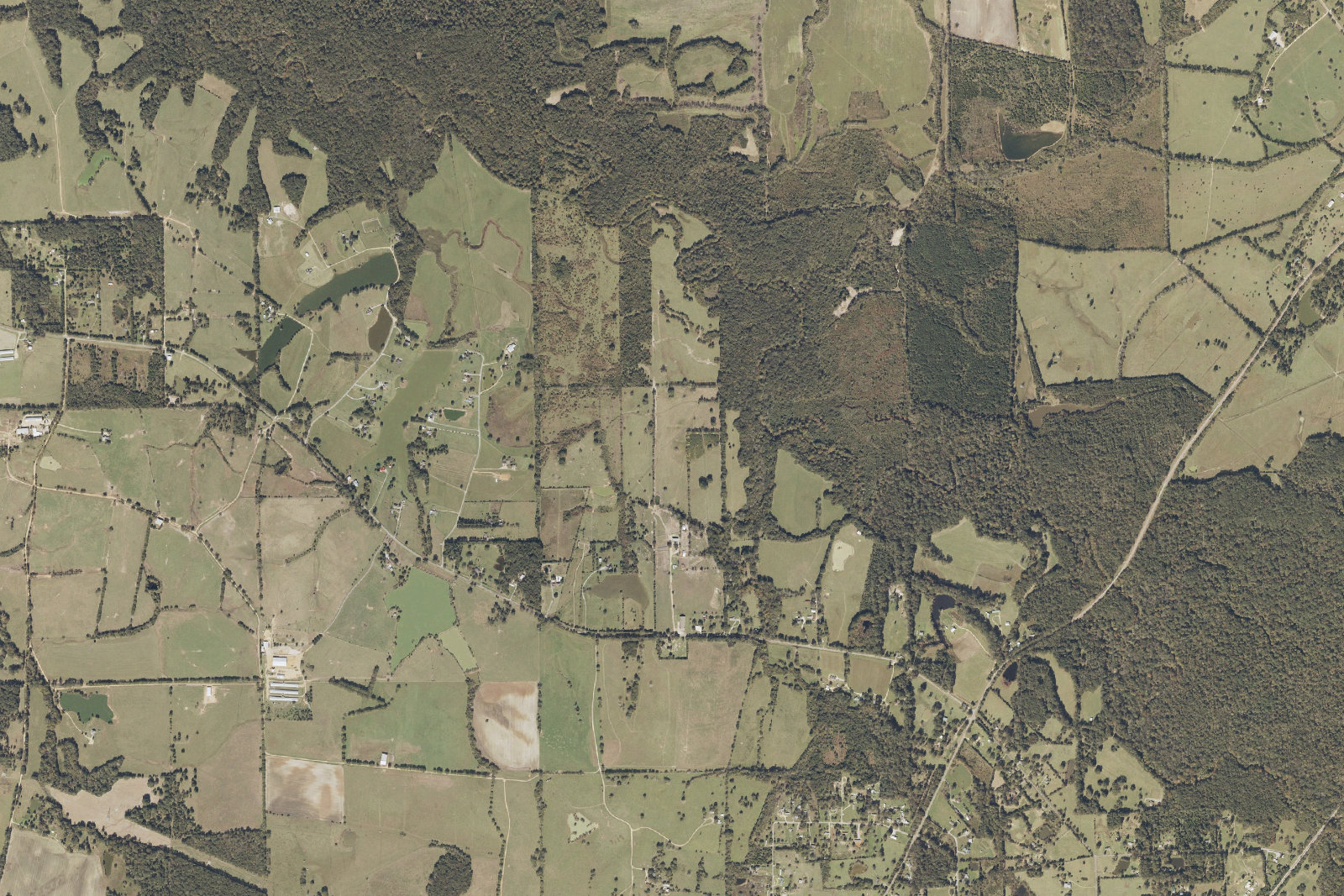 USGS aerial of the Hope Hull industrial corridor, Montgomery County, Alabama, with surrounding transmission infrastructure visible.